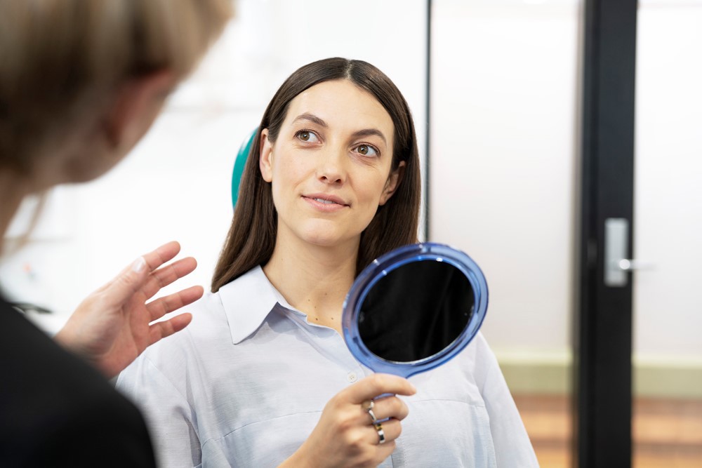 Lady At A Teeth Whitening Consultation